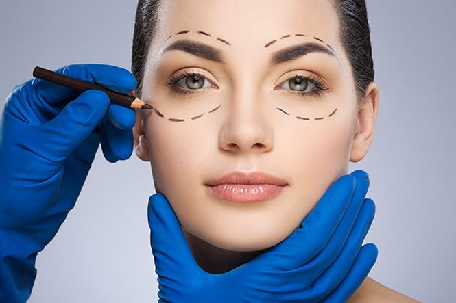 Cosmetic surgery patient with surgical lines on her face in Westchester, NY. 